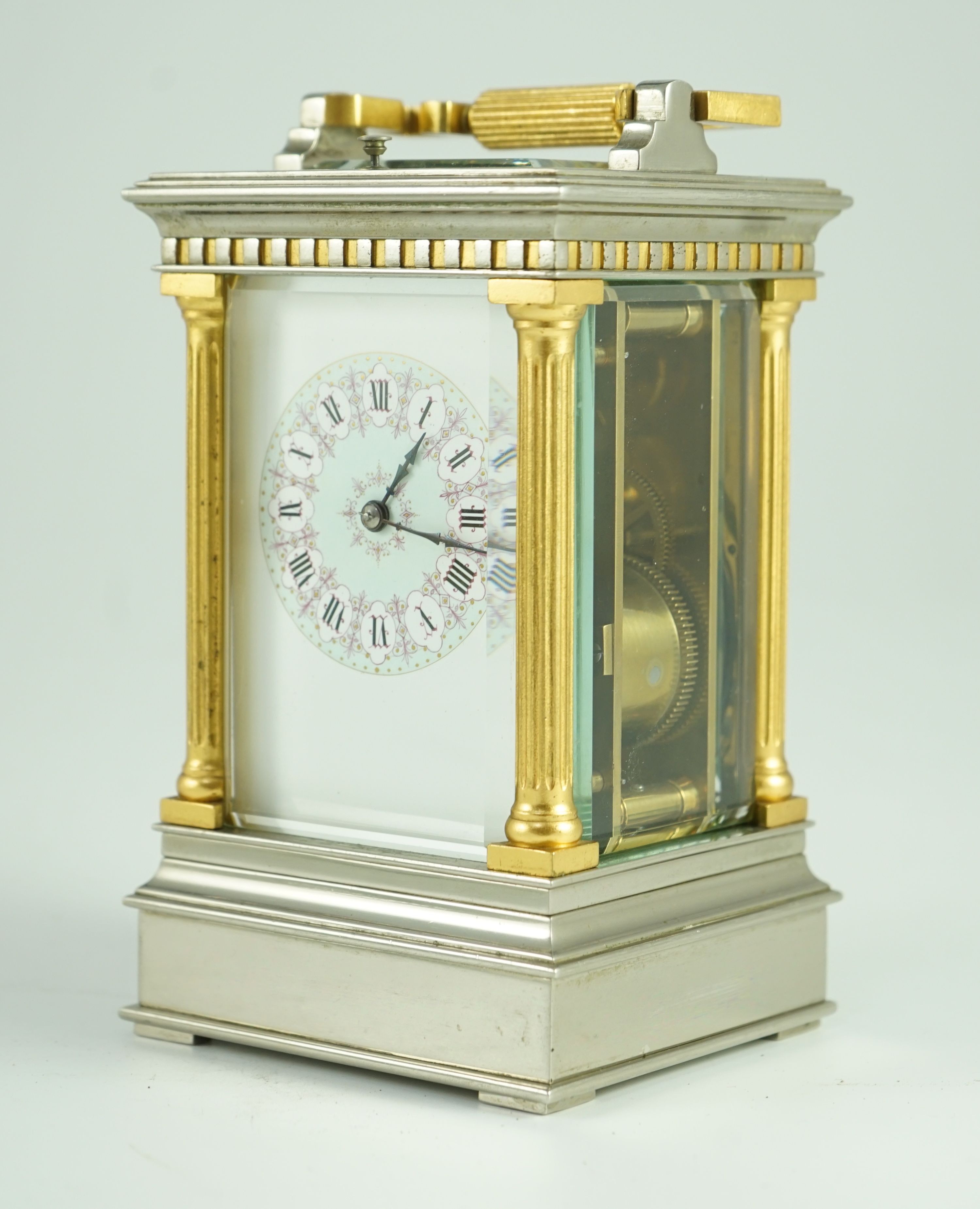 A late 19th century French hour repeating silvered and gilt brass carriage clock, width 10cm, depth 9cm, height 17.5cm